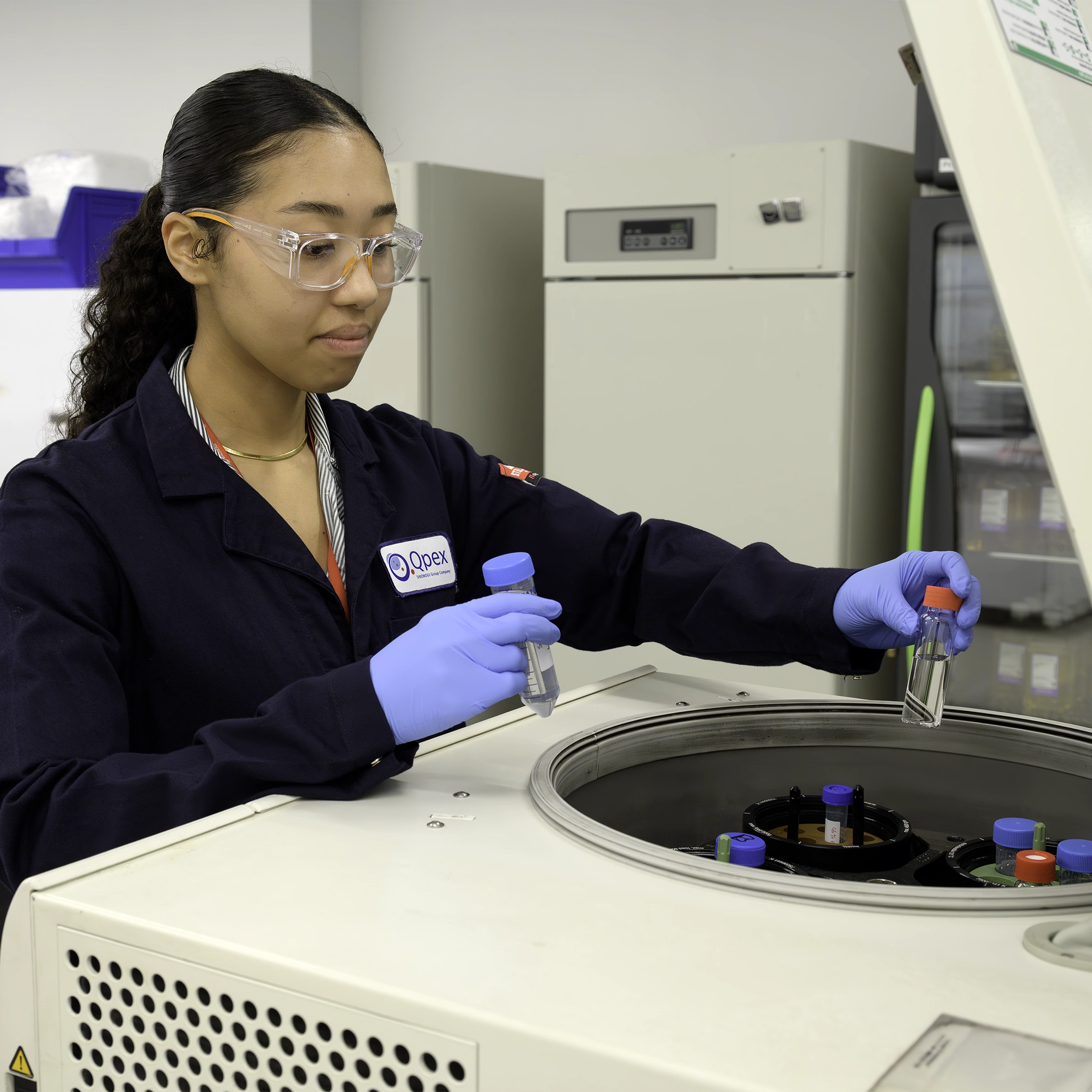 Qpex employee working in the lab.