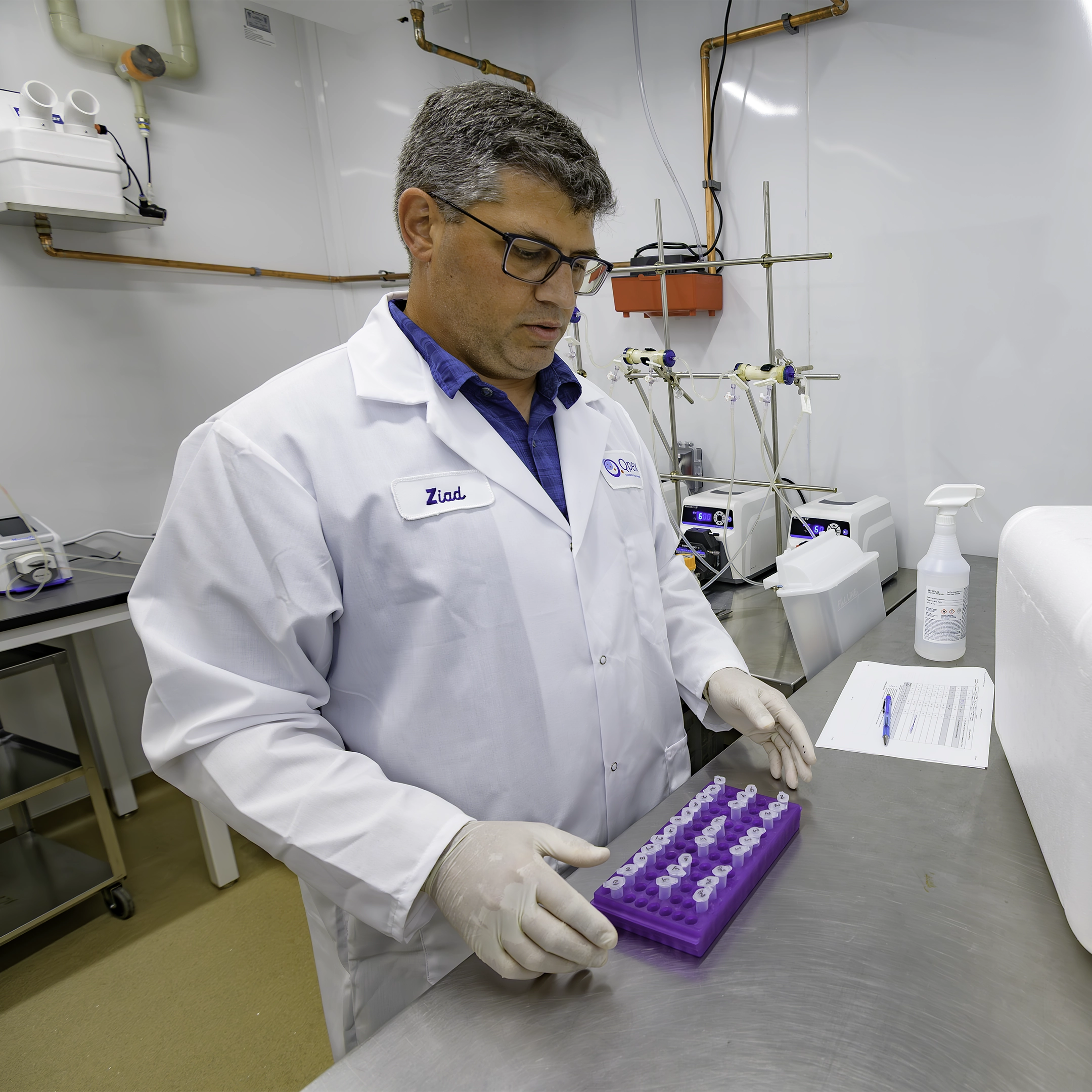 Qpex employee working in the lab.