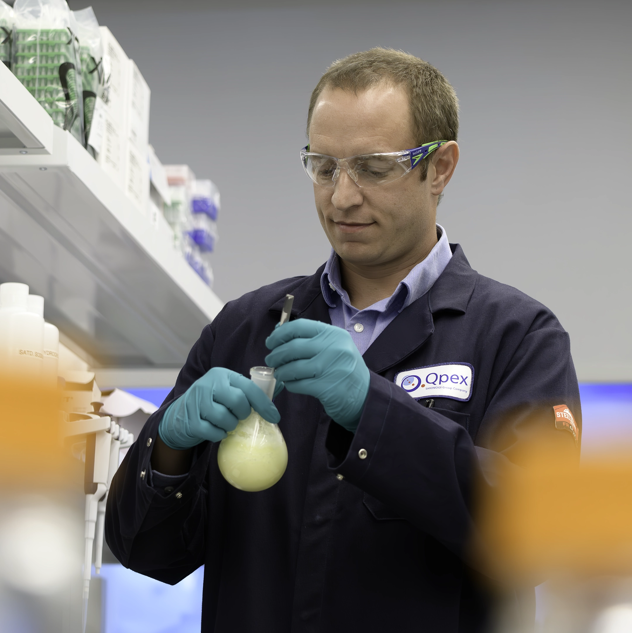 Qpex employee working in the lab.